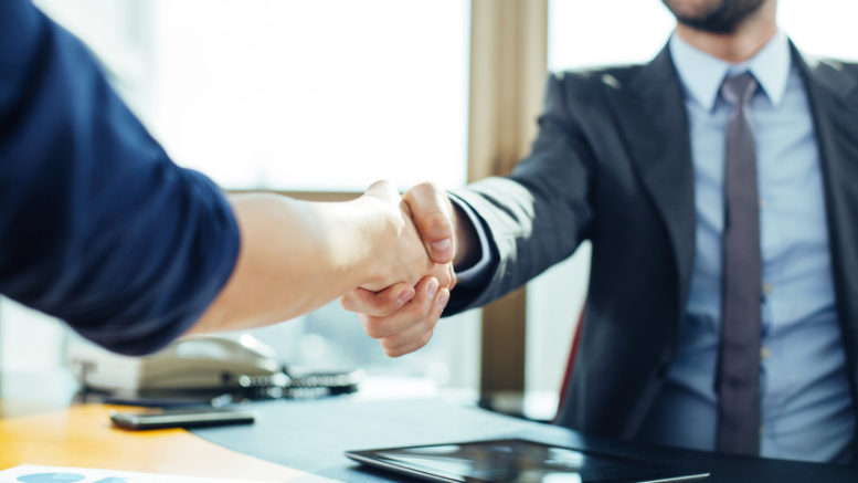 Close up of business handshake in the office