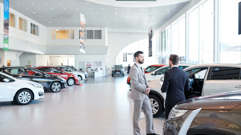 People in auto showroom