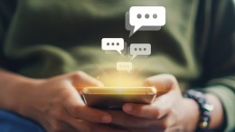 Women hand using smartphone typing, chatting conversation in cha