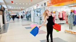 Girl with shopping bags in the mall.